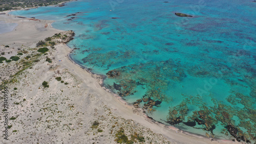 Aerial drone panoramic view photo of famous exotic paradise sandy deep turquoise beach of Elafonissi in South West Crete island, Greece