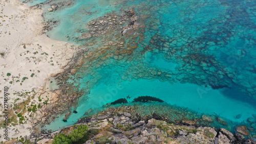 Fototapeta Naklejka Na Ścianę i Meble -  Aerial drone panoramic view photo of famous exotic paradise sandy deep turquoise beach of Elafonissi in South West Crete island, Greece