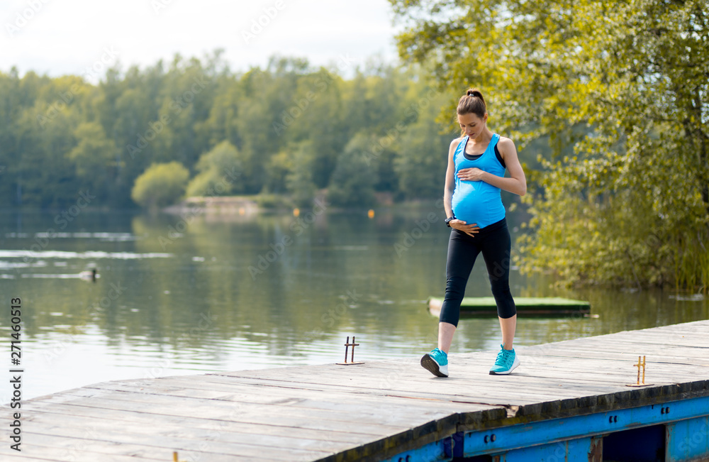 Pregnant and sport, woman working out outdoor