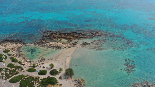 Wallpaper Mural Aerial top view photo of men practising wind surfing in exotic paradise open ocean bay with crystal clear turquoise sea Torontodigital.ca