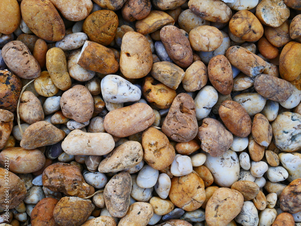 brown stone background, smooth pebble stone background brown stone background, smooth pebble stone background