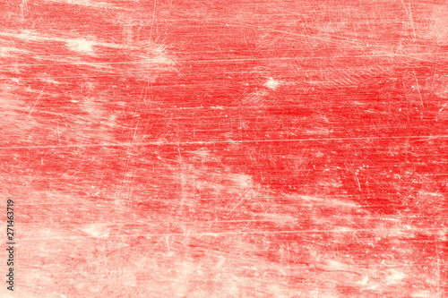Grunge, dirty, scratched, unevenly colored red background.