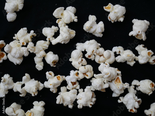 closeup pop corn isolated black background photo