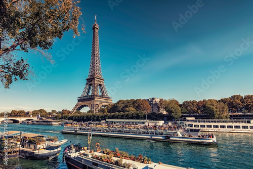 Eiffel Tower in Paris in tourist season