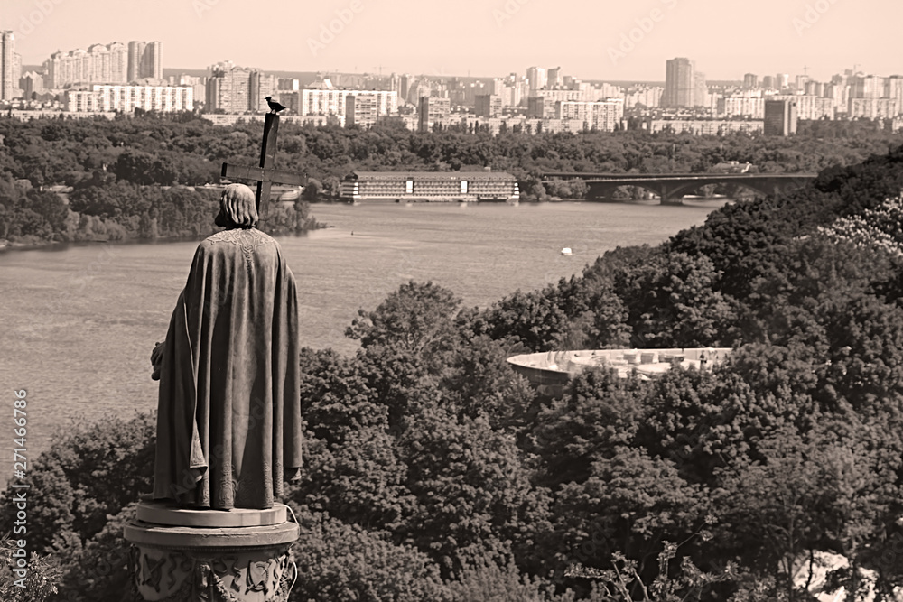 Saint Vladimir Monument  in urban park Volodymyrska Hill and view of Dnieper River in Kyiv, Ukraine