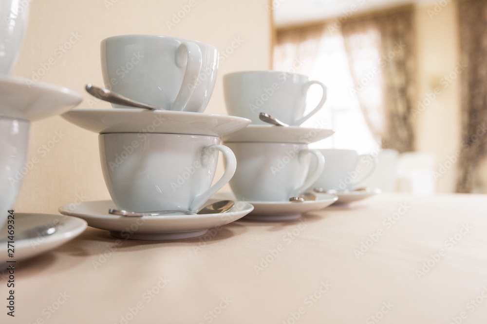 Many cups on table, concept of catering, food service or banquet service Many cups on table, concept of catering, food service or banquet service