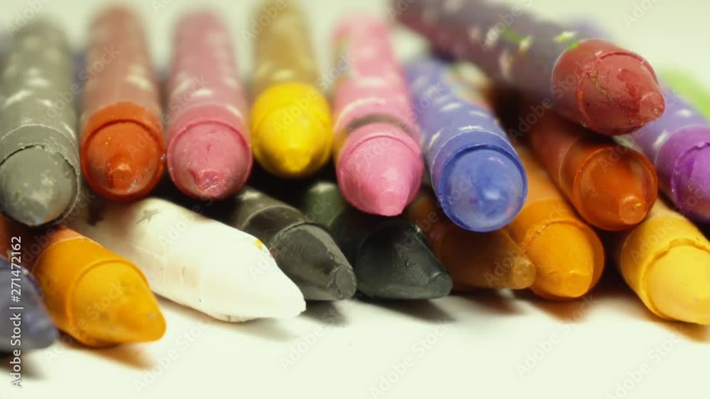 Wax crayons coming into the frame selective focus