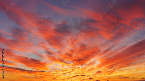 beautiful cloudscape at sunset with red clouds on sky