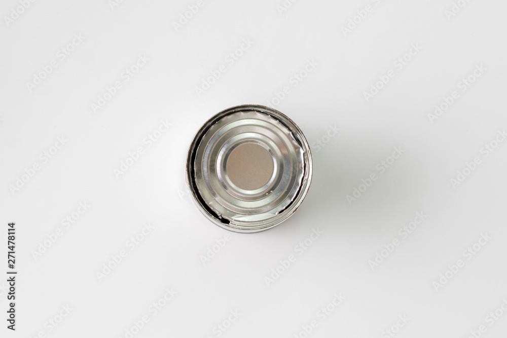 opened tin can on the table without leftovers from the food, meal concervations