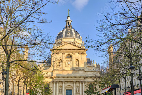 Scenic view of ancient University of France (Sorbonne) in old touristic historic city Paris. Beautiful summer happy look of old building in ancient capital of France