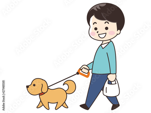 犬と散歩する若い男性