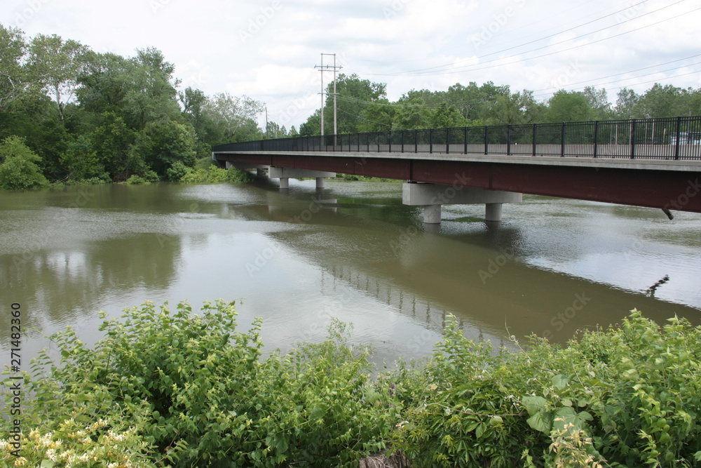bridge over flooded river