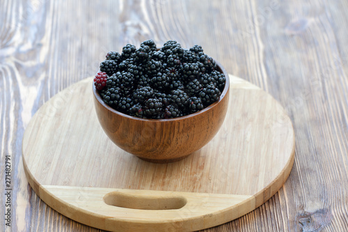 Sweet blackberry in bowl