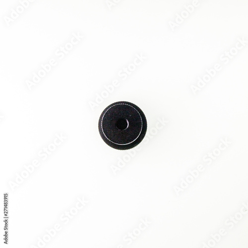 round black cap from the pencil case on white background