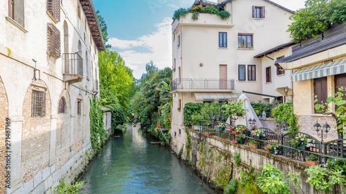 Cityscape of Portogruaro in Veneto Italy with lemene river and houses