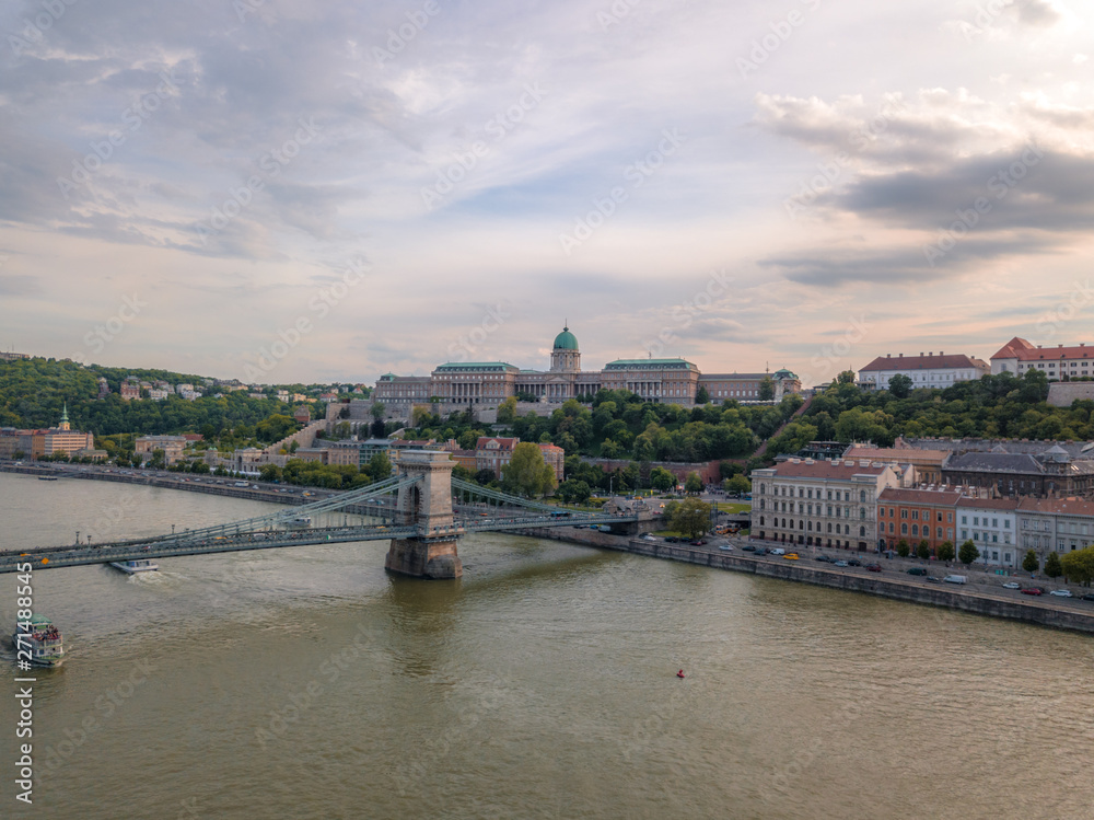 Obraz premium Aerial of Danube river panorama with a view on Buda castle and Chain Bridge in central Budapest