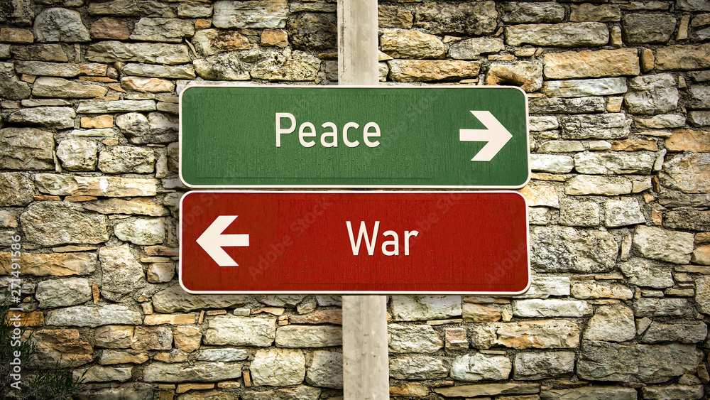 Street Sign to Peace versus War Street Sign to Peace versus War