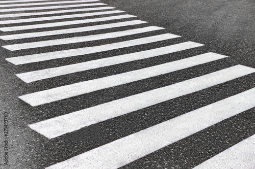 Zebra crossing. Crosswalk on the raod in the city. Ð edestrian crossing.