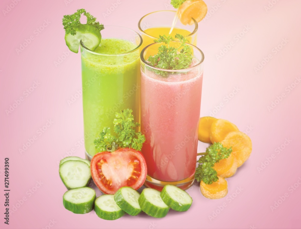 Healthy vegetable juices on background Healthy vegetable juices on background