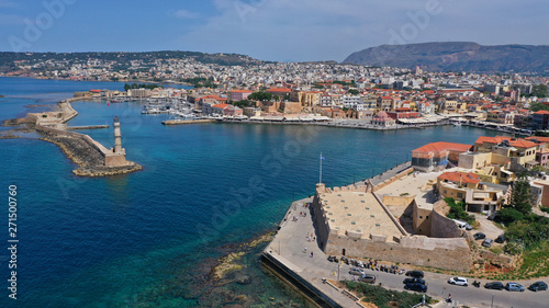 Aerial drone panoramic view of iconic and picturesque Venetian old port of Chania with famous landmark lighthouse and traditional character, Crete island, Greece © aerial-drone