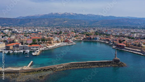 Fototapeta Naklejka Na Ścianę i Meble -  Aerial drone panoramic view of iconic and picturesque Venetian old port of Chania with famous landmark lighthouse and traditional character, Crete island, Greece