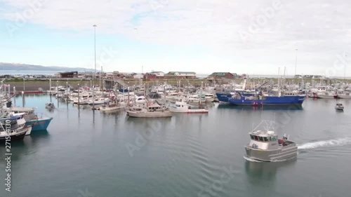 Spectacular views of Kachemak bay and the busy Homer Alaska boat harbor on the spit.