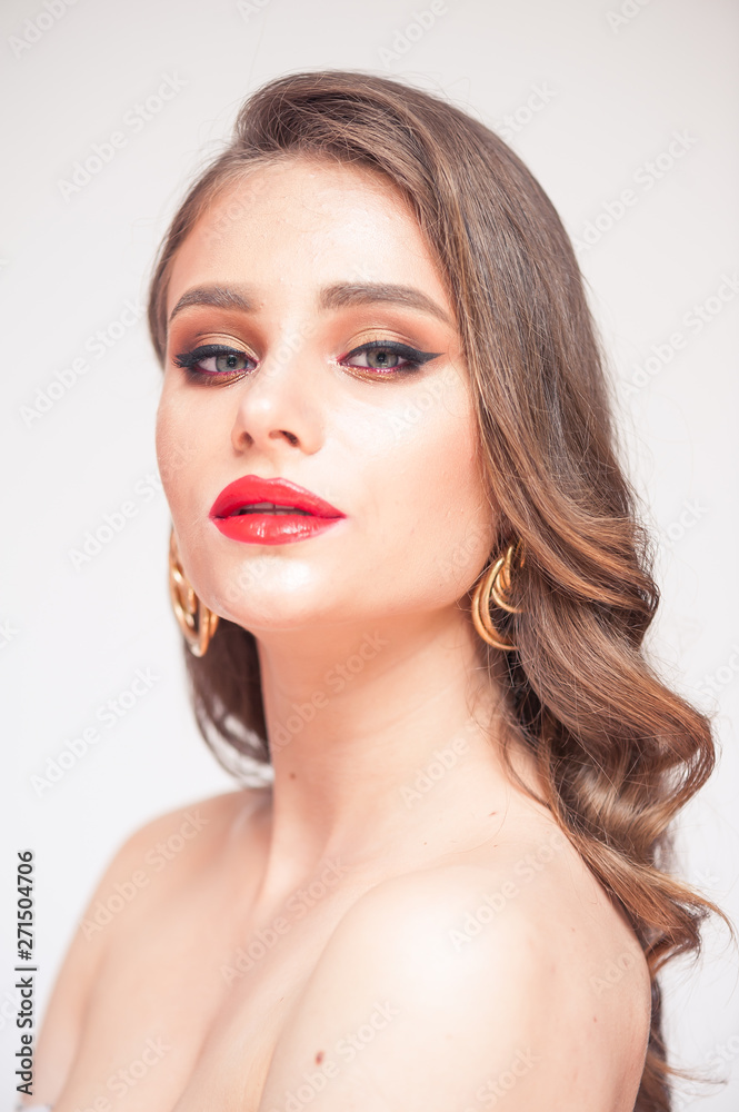 Eyelashes Makeup. Woman Beauty Face With Black Lashes Extensions and Red Lips Eyelashes Makeup. Woman Beauty Face With Black Lashes Extensions and Red Lips