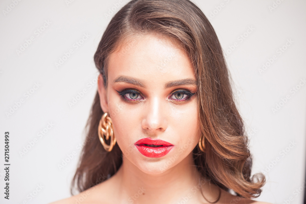 Eyelashes Makeup. Woman Beauty Face With Black Lashes Extensions and Red Lips Eyelashes Makeup. Woman Beauty Face With Black Lashes Extensions and Red Lips