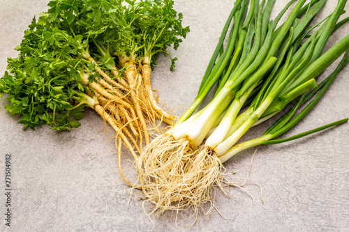 Fresh greens on a stone background