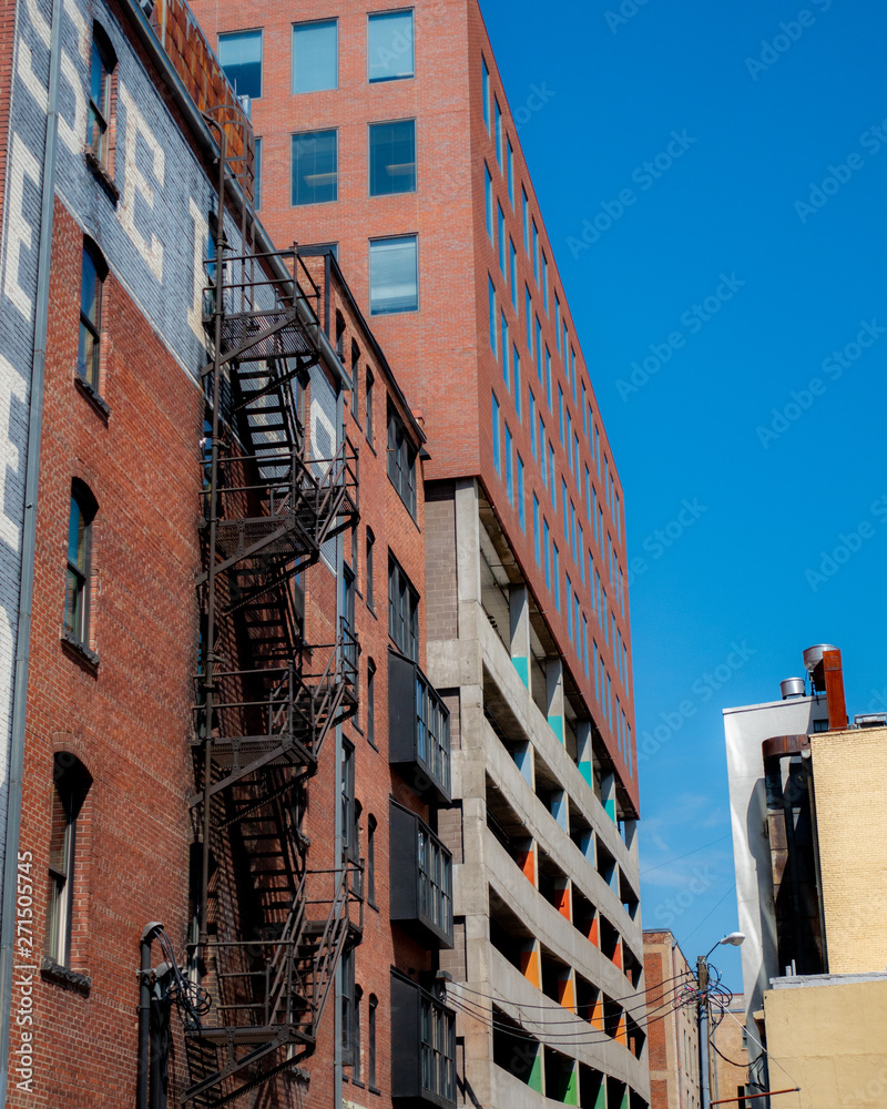 Building with Fire Escape Ladder on a Sunny Day