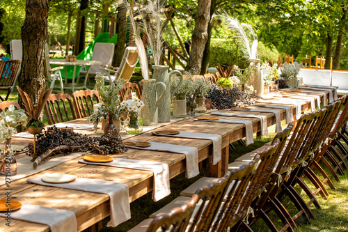 Details of the marriage ceremony held in the garden in the summer.