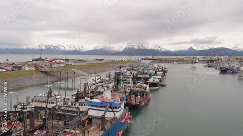 Spectacular views of Kachemak bay and the busy Homer Alaska boat harbor on the spit.