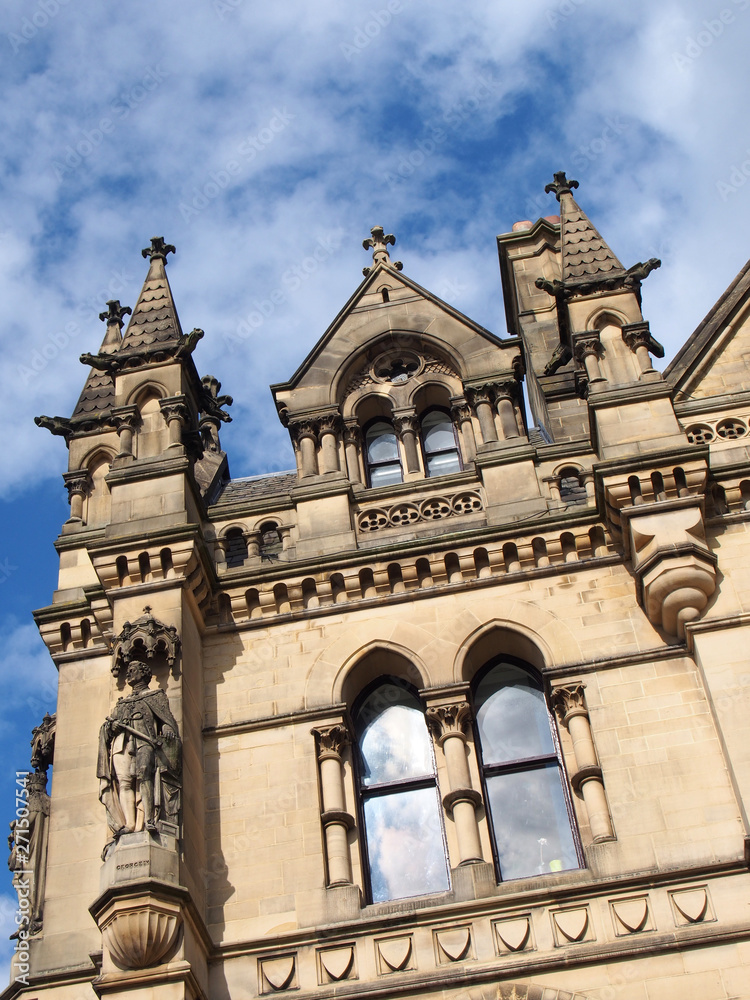 close up detail view of bradford city hall in west yorkshire a victorian gothic revival sandstone building with statues and clock tower