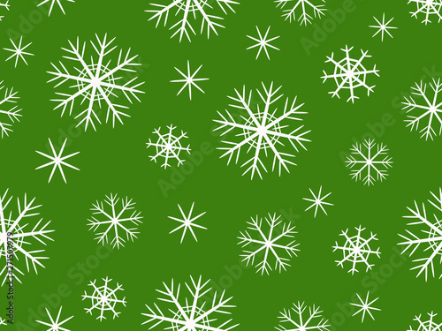  Decorative gray snowflakes on a green background.