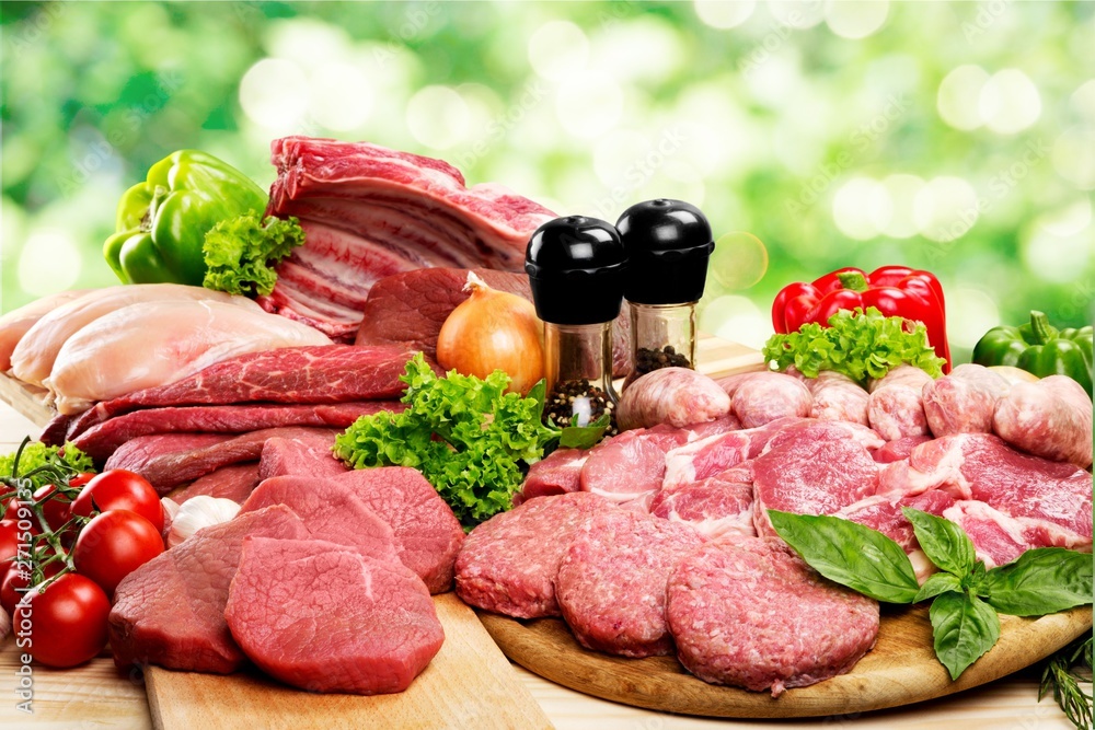 Fresh Raw Meat Background with vegetables Fresh Raw Meat Background with vegetables