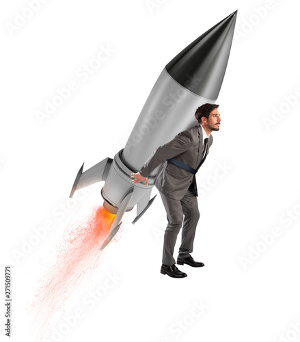 Bild auf Leinwand Determination and power businessman that holds a rocket isolated on white background