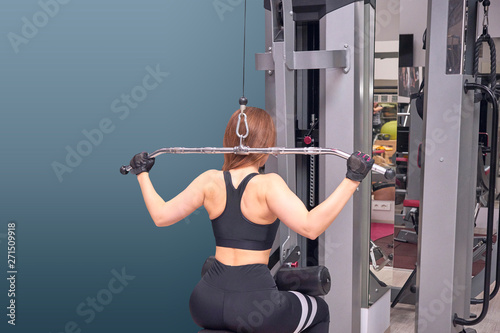 Woman trains in the gym