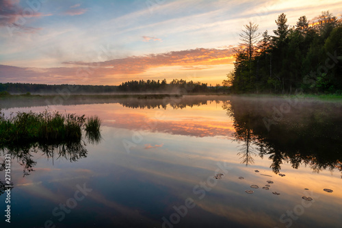 Morning sunrise on a swamp on Fish House Road in Gallway New York, Adirondacks