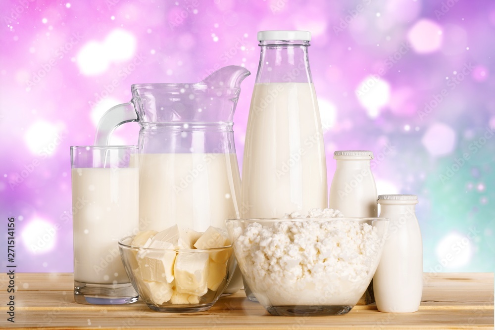 Glass of milk and Dairy products on background Glass of milk and Dairy products on background