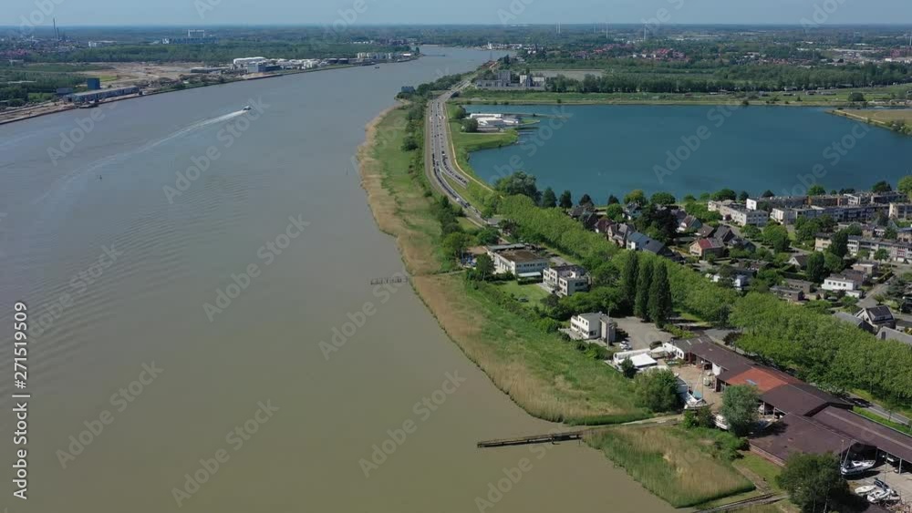 Aerial view of cityscape of Antwerp, modern part of city, residential areas and river Scheldt - landscape panorama of Belgium from above, Europe Aerial view of cityscape of Antwerp, modern part of city, residential areas and river Scheldt - landscape panorama of Belgium from above, Europe