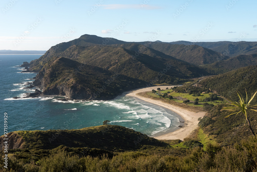 Elevated view of Tatoputopu Bay from the coastal walking track to Cape Reinga, Northland, New Zealand.