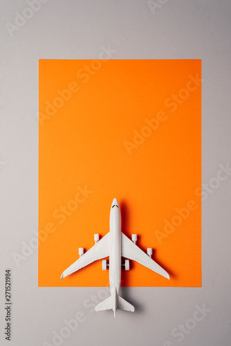 jet airplane travel concept, minimal art, orange background.