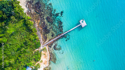 Aerial view of wood pier in to the sea and ocean for travel and vacation.