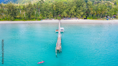 Aerial view of wood pier in to the sea and ocean for travel and vacation.