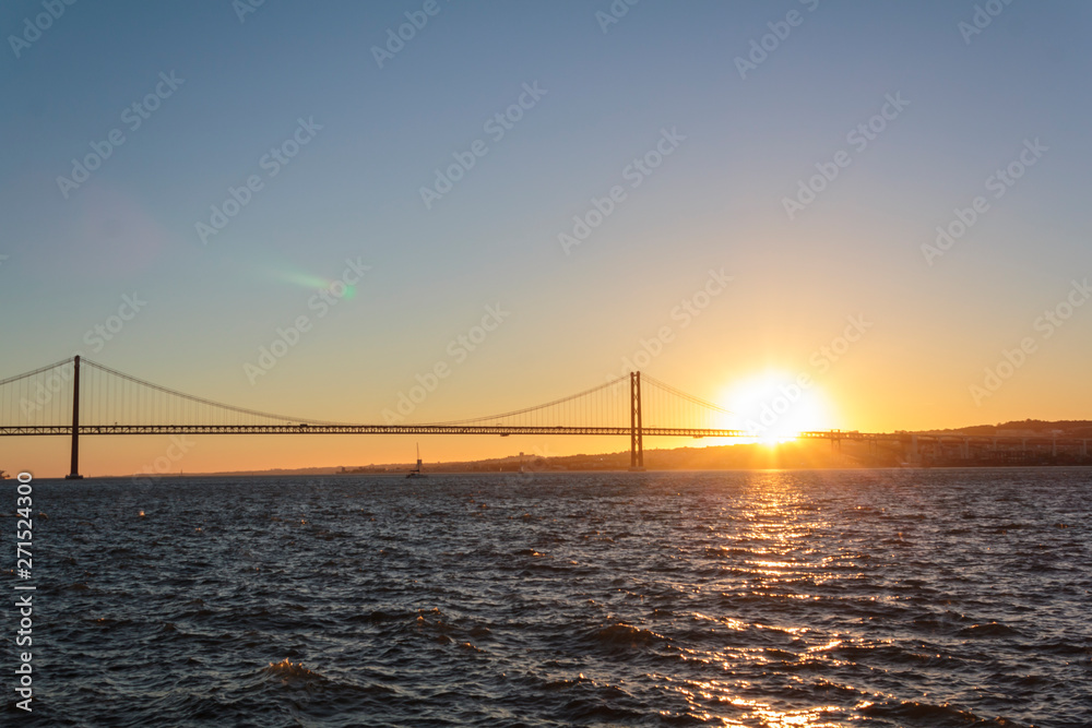 Suspension Bridge and river at sunset Suspension Bridge and river at sunset