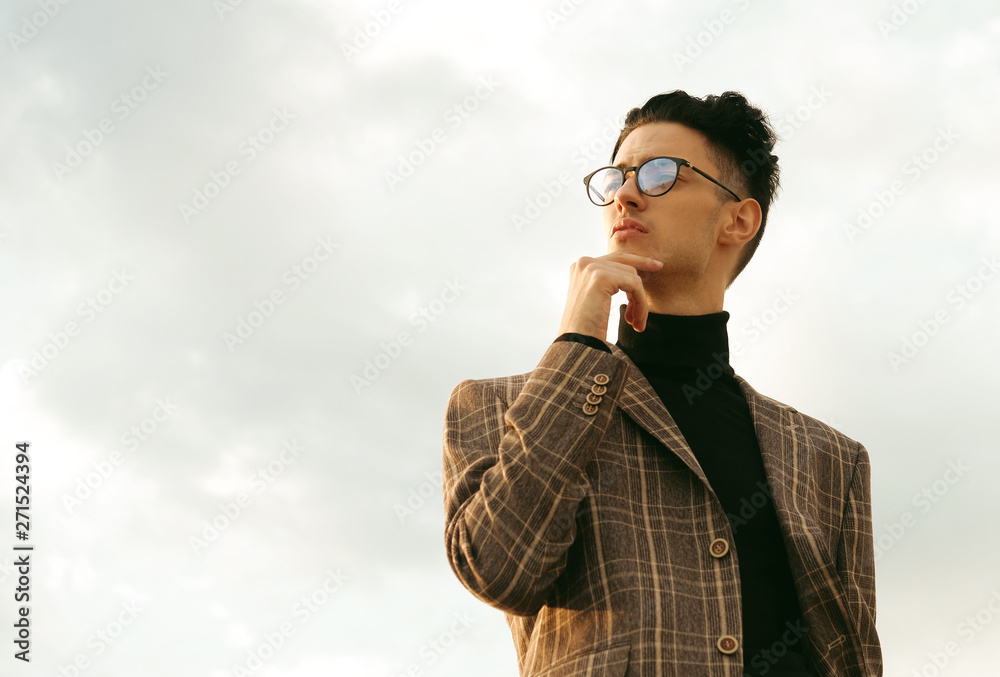 Elegant fashionable man in glasses