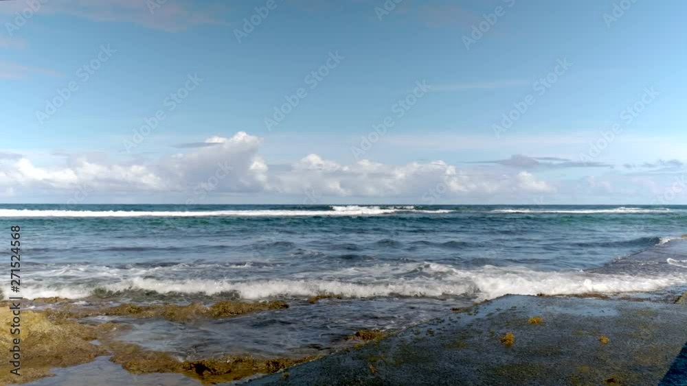 Closeup shot of majestic waves rolling onto a secluded beach Closeup shot of majestic waves rolling onto a secluded beach
