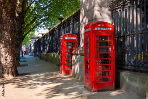 Traditional vintage red K6 telephone kiosk in London, UK