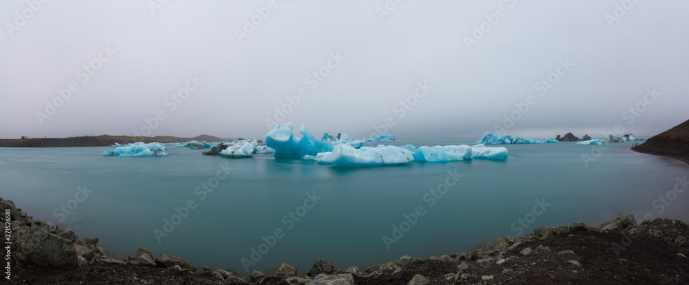 Panorama view of icebergs in jokulsarlon glacier lagoon in Iceland,  The jokulsarlon is a large glacial lake in southeast Iceland, on the edge of Vatnajokull National Park.
