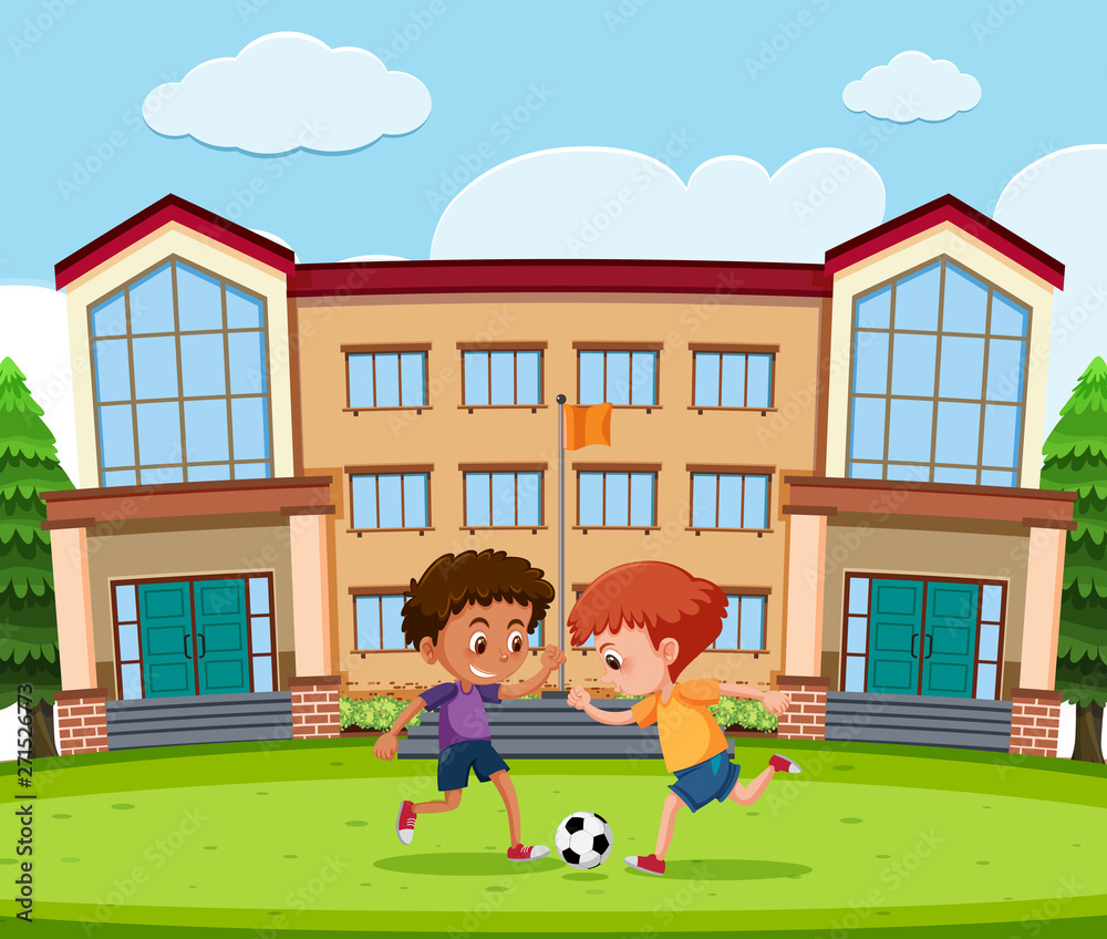 Boys playing football in front of school Boys playing football in front of school